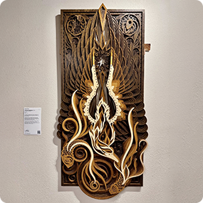 Laser cut wooden decorative panel with detailed artistic pattern