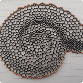 Precision laser cut perforated metal discs for industrial applications