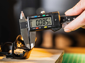 Dimensional inspection of a laser cut component against drawing tolerances