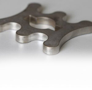 Ground custom metal part with smooth edges and improved surface quality