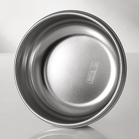 Welded circular metal component with clean joint and finished surface
