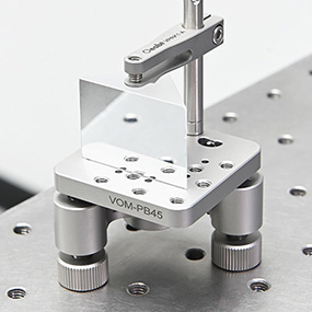 Precision ground metal fixture with clean edges and finished surfaces for tooling and assembly use