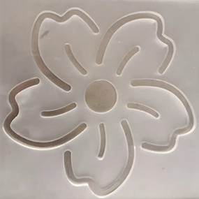 Laser cut plastic decorative part with smooth profile edges