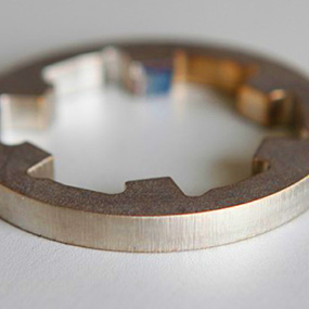 Laser cut circular metal part with clean profile and smooth edge