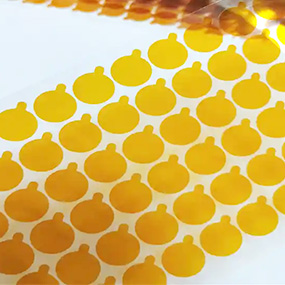 Laser cut PI film array for electronics and insulation applications