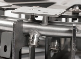 Clean welded metal surface prepared for finishing, polishing or inspection