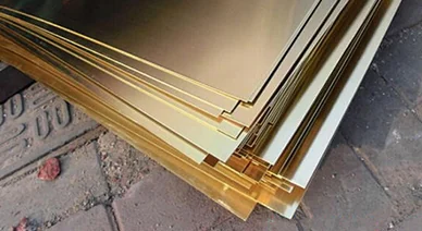 Stacked brass sheet stock before fabrication