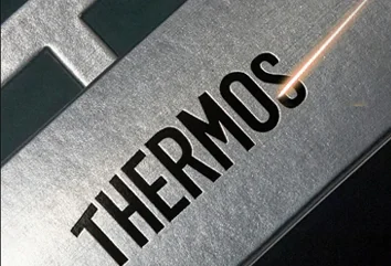 Laser marking on a finished metal component