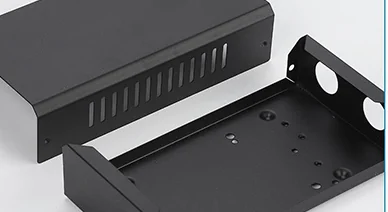Black formed sheet metal tray and cover with mounting holes, flanges and ventilation slots